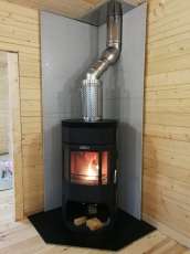 Недорогой камин с отделкой шамотом Сибирь 12 фото в интерьере в Бресте