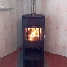 Недорогой камин с отделкой шамотом Сибирь 12 фото в интерьере в Бресте