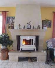 Печь-камин чугунный Invicta Bradford в интерьере Амазонка бай фото в Бресте