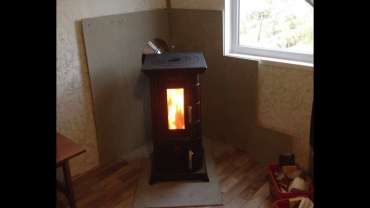 Отопительная печь Термофор Статика Тетра, чёрная бронза фото в интерьере в Бресте