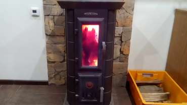 Стальная печь Термофор Статика Тетра, чёрная бронза фото в интерьере в Бресте