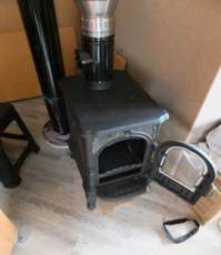 Недорогой печь-камин со стеклом Сибирь 6 фото в интерьере в Бресте