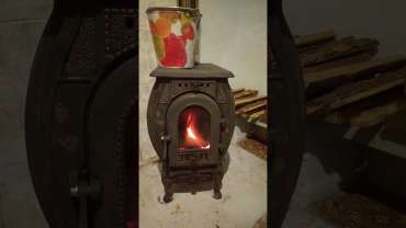 Печь отопительно-варочная чугунная "Сибирь" фото в интерьере в Бресте