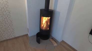 Стильная печь-камин с шамотом Мета-Бел Селигер в Бресте фото в интерьере в Бресте