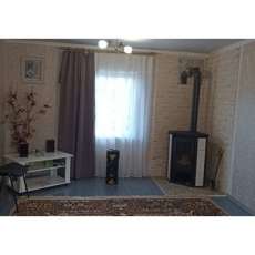 Стальной камин с шамотом Мета-Бел Ритм L фото в интерьере в Бресте