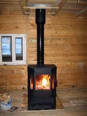 Печь-камин Бавария водяной с плитой в интерьере в Бресте
