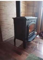 Печь-камин чугунный FireWay Gunter в интерьере чёрный Амазонка бай фото в Бресте