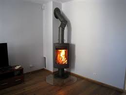 Печь-камин чугунный Invicta Alios в интерьере Амазонка бай фото в Бресте