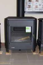 Печь-камин чугунный Invicta Carolo в интерьере Амазонка бай фото  в Бресте