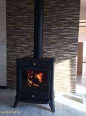 Печь-камин чугунный Invicta Altea в интерьере Амазонка бай фото в Бресте