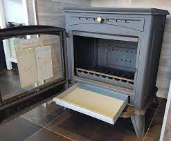 Печь-камин чугунный Invicta Altea в интерьере Амазонка бай фото в Бресте