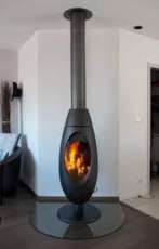 Печь-камин чугунный Invicta Ove в интерьере Амазонка бай фото в Бресте